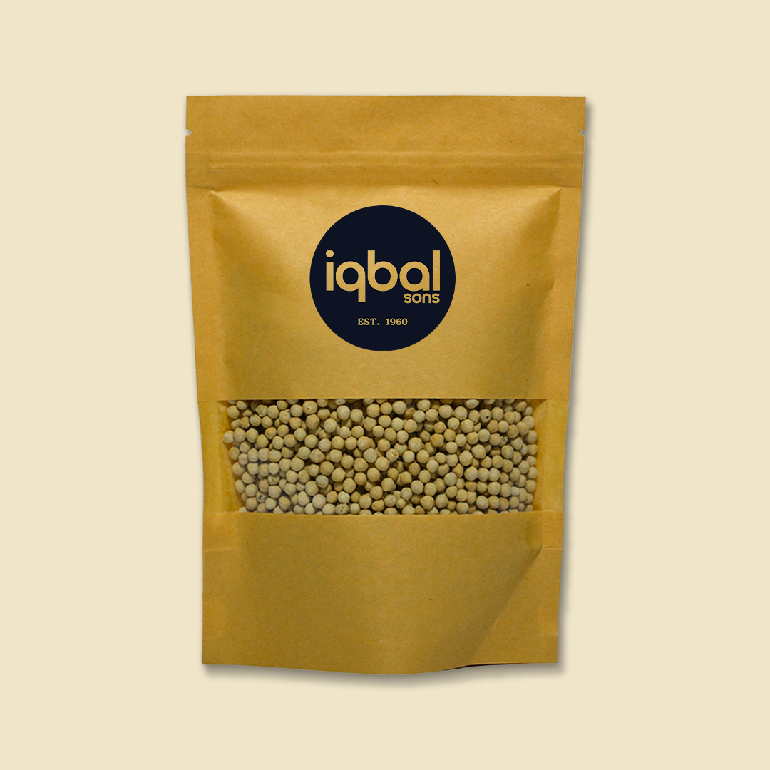 Yellow package of seeds with 'iqbal Sons' branding on a beige background